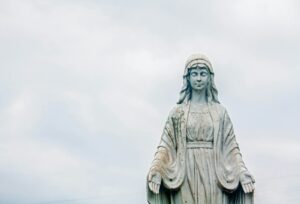 gray concrete statue of a man